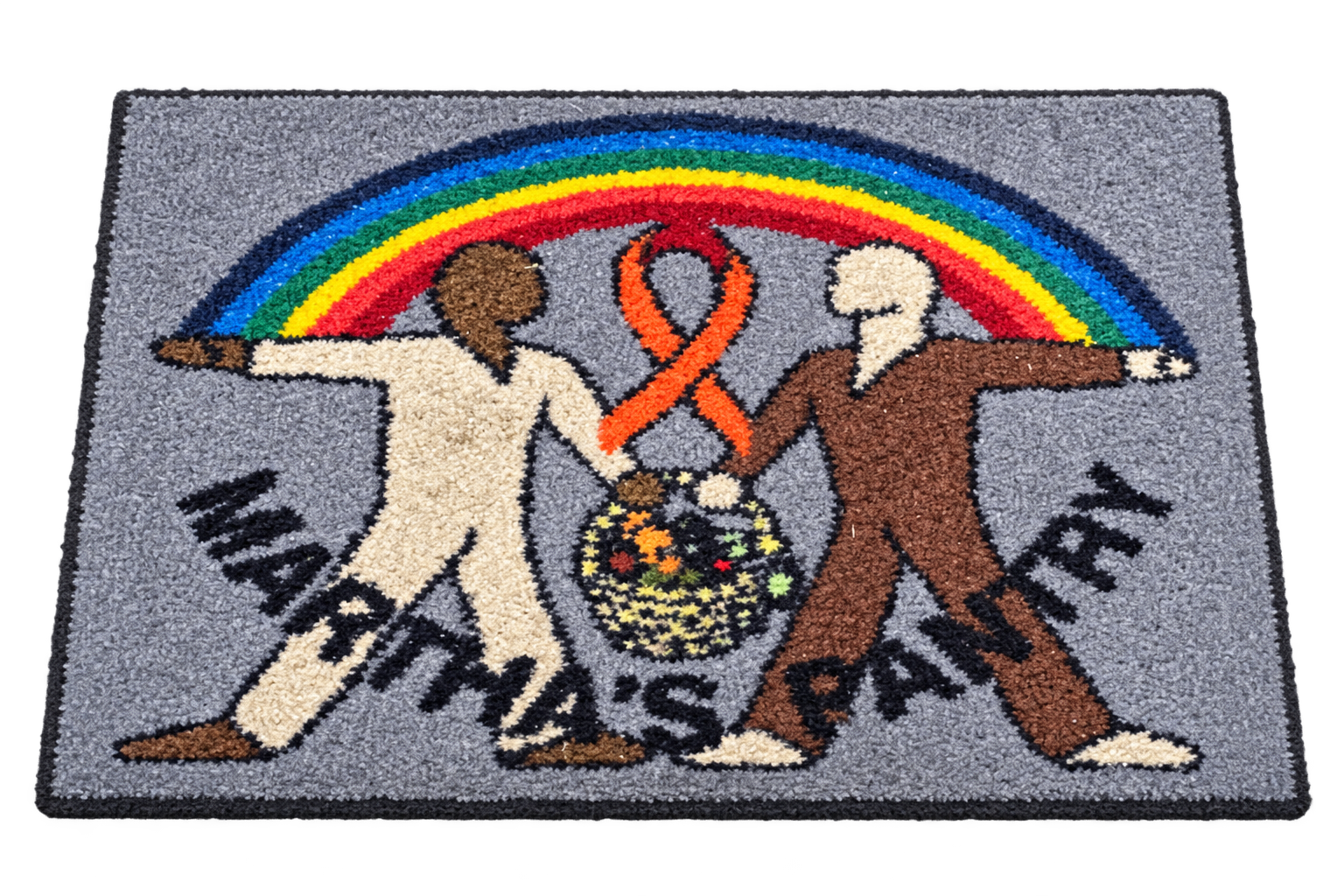 Martha’s Pantry mat with a rainbow, two figures, and an orange ribbon